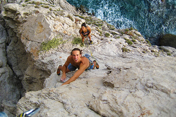 Multi-pitch climbing Punta Campanella in Amalfi Coast, Italy